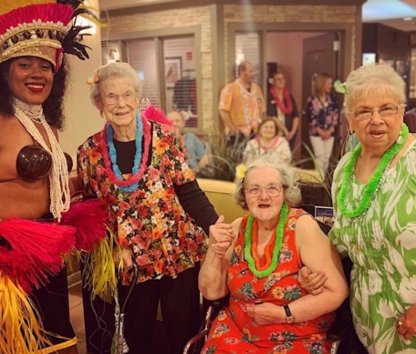 residents of Alden Estates of Shorewood celebrate at luau